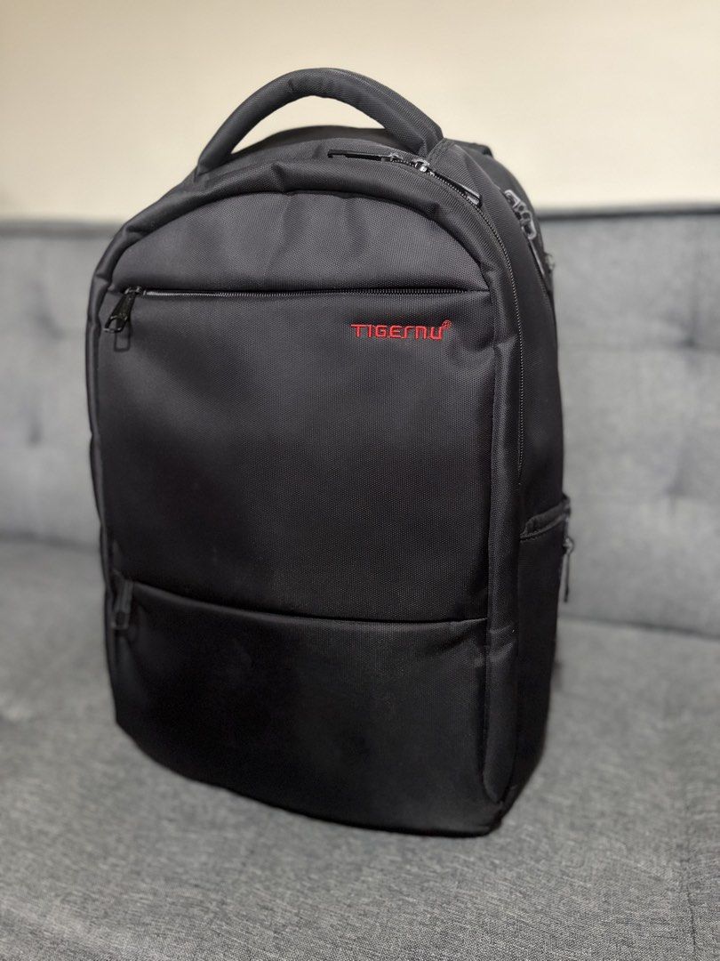 Tigernu Bag (Category: Laptop Bags & Sleeves) located in Manila. Submitted by precio (Listing ID 1455315974, Image 1). Description: - Brand: Tigernu - Bought: in Japan 🇯🇵 - Features: Multiple pockets and 2 hidden ones at the back, perfect for laptops, valuables, and phones.