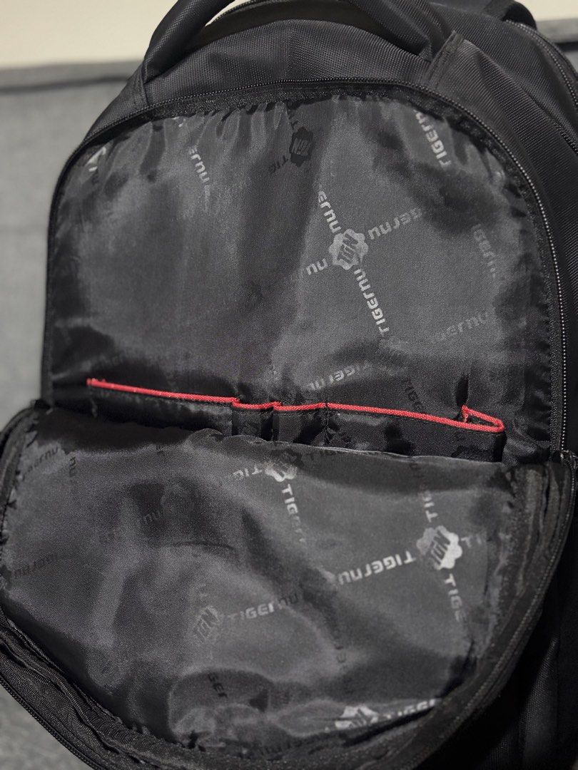 Tigernu Bag (Category: Laptop Bags & Sleeves) located in Manila. Submitted by precio (Listing ID 1455315974, Image 3). Description: - Brand: Tigernu - Bought: in Japan 🇯🇵 - Features: Multiple pockets and 2 hidden ones at the back, perfect for laptops, valuables, and phones.