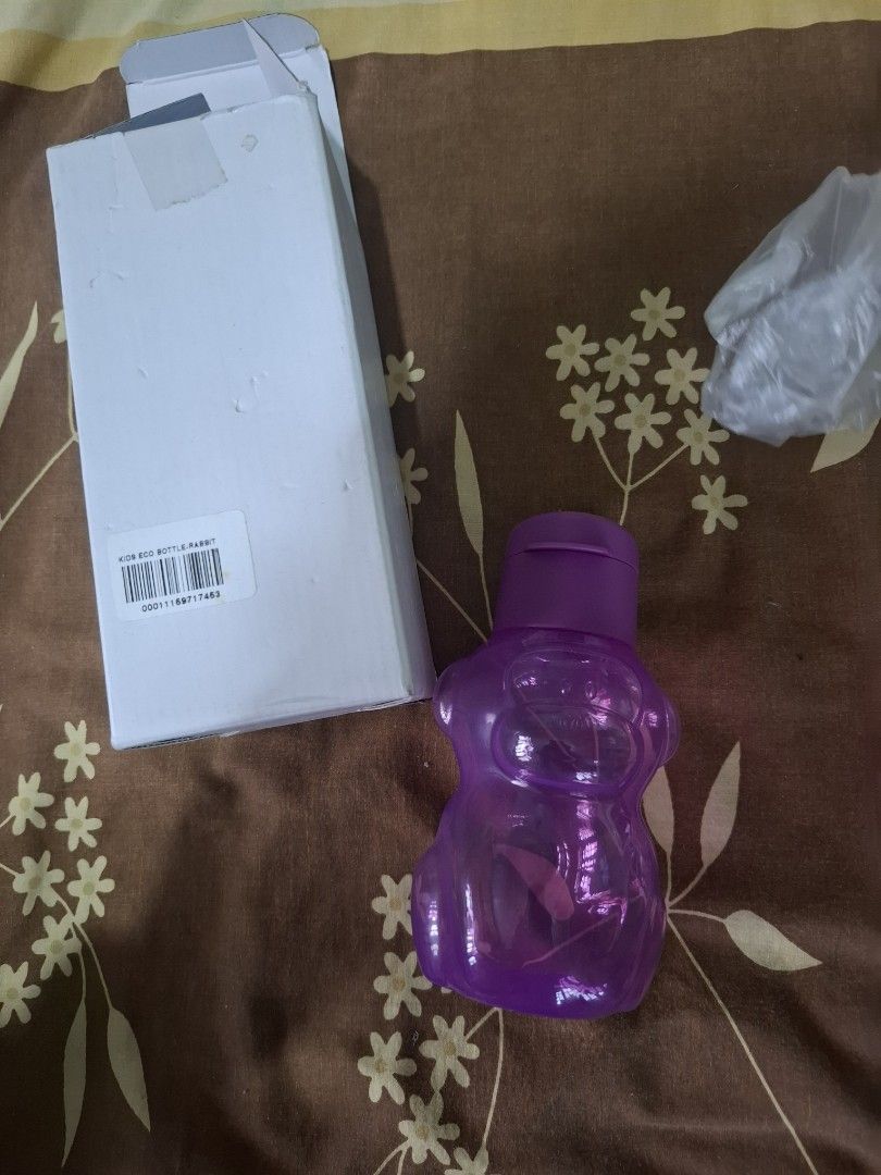 Tupperware Kids Eco Bottle Bunny Purple (Category: Water Bottles & Tumblers) located in Davao. Submitted by skyefinds (Listing ID 1455203077, Image 3). Description: - Adorable purple bunny design, perfect for kids! - Genuine Tupperware quality for durability. - Features a convenient flip-top lid for easy sipping. - Ideal for school, picnics, and everyday adventures. - Child-friendly and easy for little hands to carry..