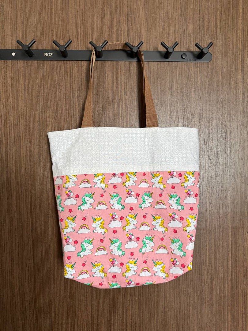 Unicorn patchwork bag (Category: Tote Bags) located in Singapore. Submitted by wysbizz (Listing ID 1455263175, Image 1). Description: 💗Unicorn patchwork bag 🦄 Selling Price: $10 Info: ❀ dimensions: 13in by 11in ❀ lined with 2 colour fabric ❀ has magnetic button Payment methods: paynow/ cash Meet up: woodlands/ Sembawang/canberra mrt / downtown mrt line ( +$1 if late for more than 15mins) Registered mailing: +$3 Ctb if interested! Check out more