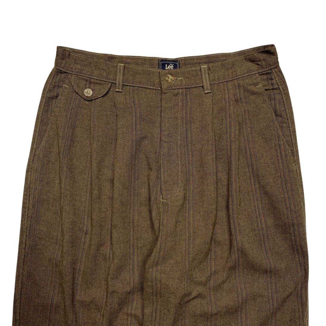 Vintage 1990’s Lee Herringbone Pleated Trouser (Category: Trousers) located in Baguio. Submitted by thesecretshop_ph (Listing ID 1455186314, Image 2). Description: Size: 14 Long Lenght: 45” Waist: 30” Crotch: 15” Leg Opening: 7” Thighs: 13” Issue: -.