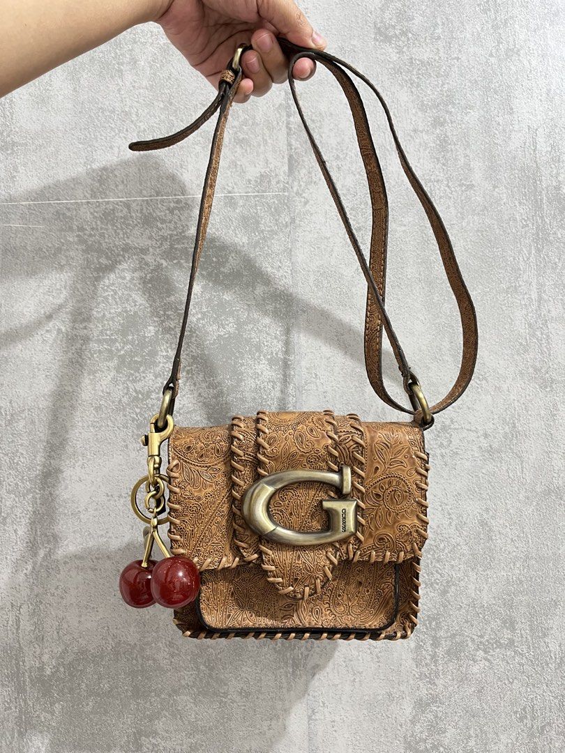Vintage Coach Mini Guess Sling (Category: Luxury Bags & Wallets) located in Calamba. Submitted by thedreambags.ph (Listing ID 1455191524, Image 1). Description: No flaws Malinis and mabango.