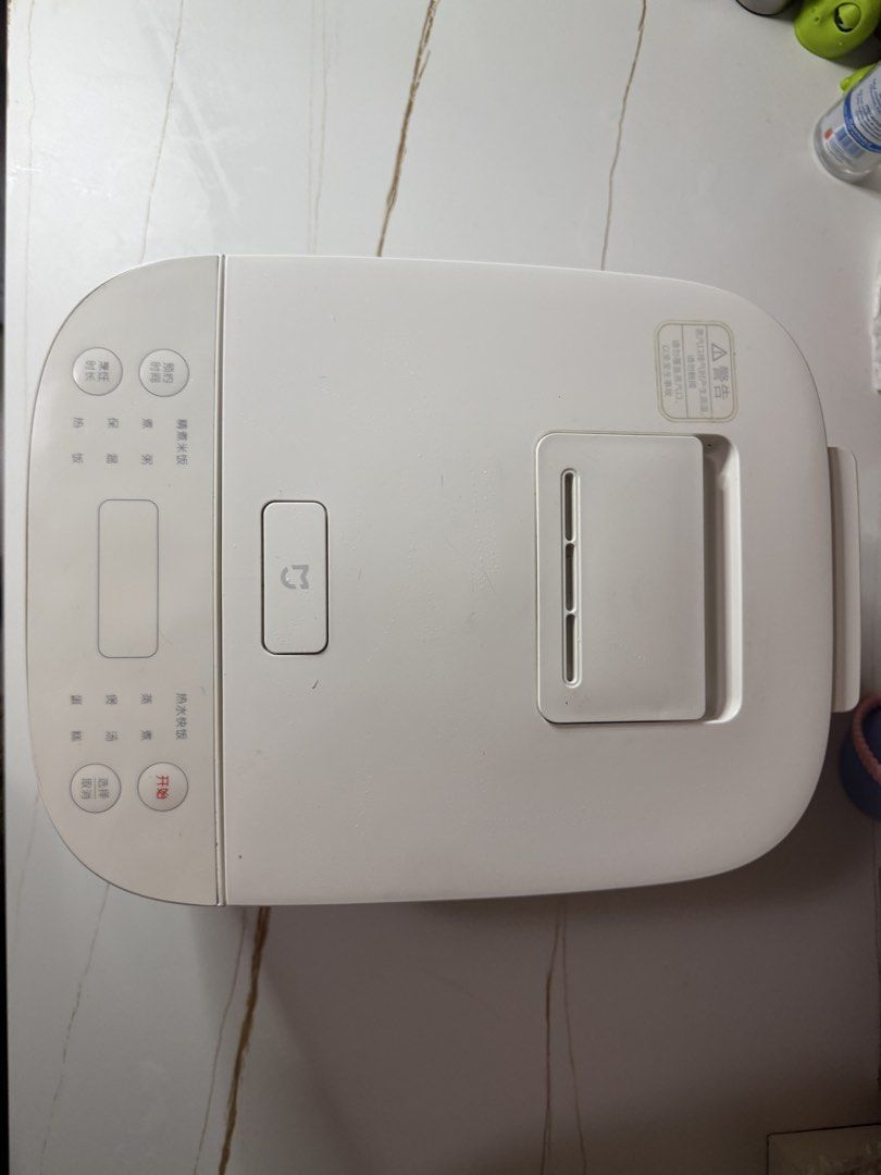 Xiaomi Mijia MDFB202ACM Rice Cooker (Category: Cookers) located in Pasig City. Submitted by rinarii (Listing ID 1455141463, Image 2). Description: - White Xiaomi Rice Cooker - Model: MDFB202ACM - Energy Efficiency Rating: 3 - Condition: Minor cosmetic damage on the side (as pictured), fully functional. - Perfect for cooking rice..