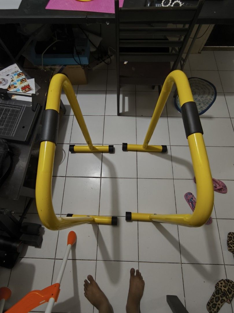 Yellow Parallel Bars for Home Gym Workout (Category: Weights & Dumbbells) located in Manila. Submitted by swiftbird_94ea39 (Listing ID 1455285781, Image 2). Description: Selling: Dip Bar Stands (2pcs) ✅ Heavy duty steel frame – matibay, kaya ang buong body weight ✅ Rubberized foot caps – hindi dumudulas at hindi nagmamarka sa floor ✅ Foam padded grip handles – comfortable sa kamay ✅ Adjustable height holes sa base (see 3rd photo) ✅ 2nd hand, func