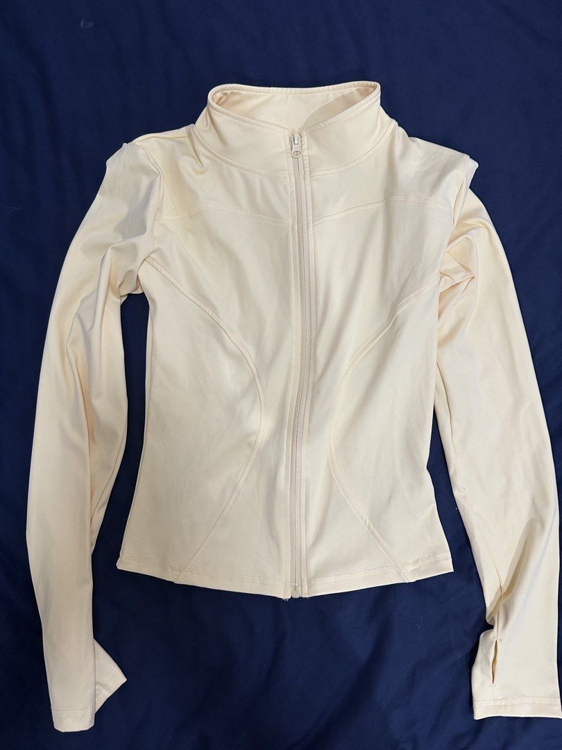 Yoga / Gym Activewear Jacket (Category: Activewear) located in Pasig City. Submitted by shopmystuff.p (Listing ID 1455245163, Image 2). Description: Butter Light yellow zip-up jacket Never used Size: L on tag but fits small to semi large .