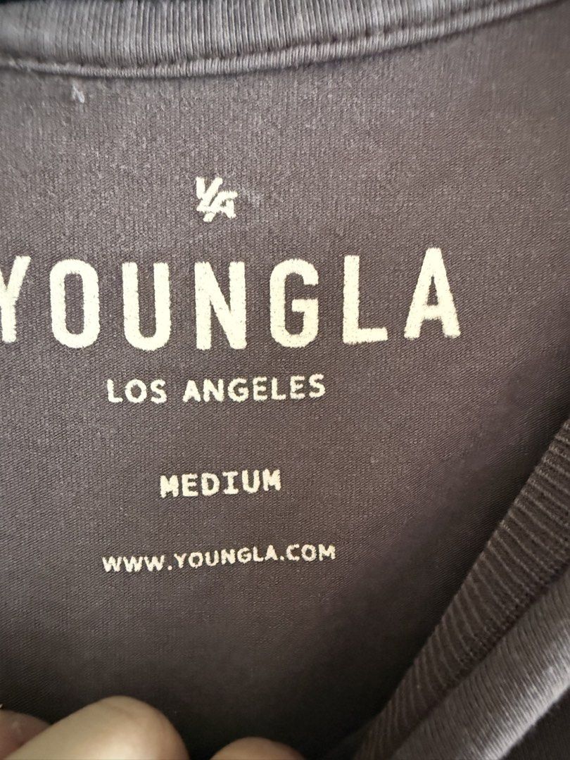 AUTHENTIC YoungLA Brown Oversized T-shirt Medium (Category: Tshirts & Polo Shirts ) located in Pasig City. Submitted by kfreed (Listing ID 1455229488, Image 3). Description: YoungLA is a famous lifiting / workout brand in USA like Gymshark - Color: Brown - Style: Oversized T-shirt - Details: White striped cuffs and hem, embroidered 'youngla' logo on sleeve - Size: Medium Bought and ordered in USA RFS: Not being worn anymore.