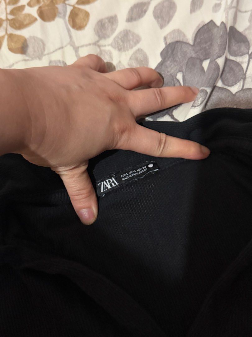 Zara Black Ribbed Collared Long Sleeve Top (Category: Longsleeves) located in Taytay. Submitted by cloudy_20 (Listing ID 1455274565, Image 2). Description: - Zara black long-sleeved top - Ribbed and stretchy material - Collared neckline with a small V-cut - Fits M-L.