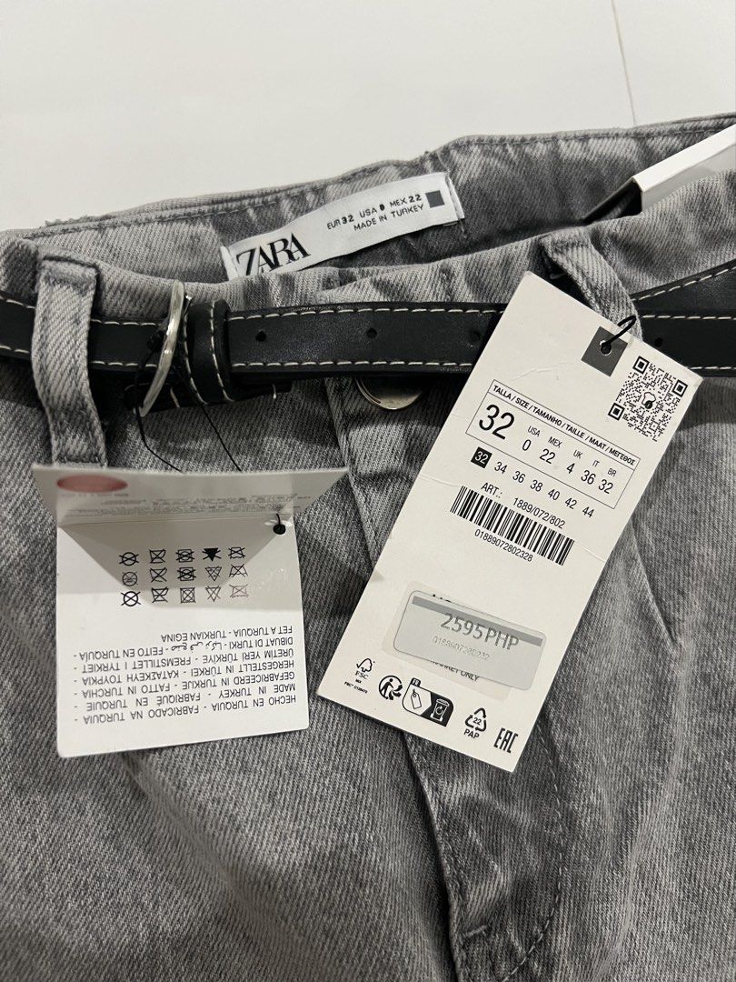 Zara Grey Wide Leg Belted Jeans (Category: Jeans) located in Cainta. Submitted by cendzz (Listing ID 1455277976, Image 2). Description: - Zara Grey Wide Leg Jeans - Size: 32 EUR - Style: High waisted - Condition: Brand new with tags, never worn - Includes: Black belt .