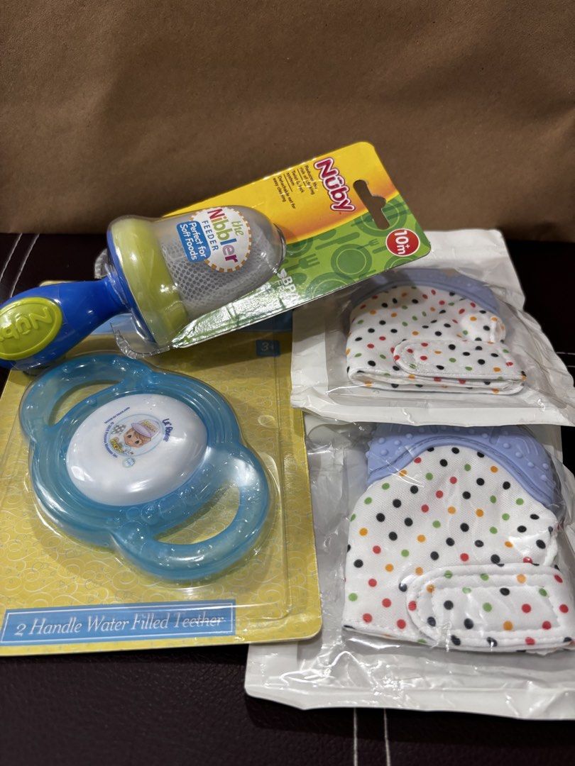 🍼 BABY FEEDING & TEETHING ITEMS – UNUSED & UNOPENED (Category: Soothers & Pacifiers) located in Paranaque City. Submitted by akosiroses (Listing ID 1455448157, Image 1). Description: 🍼 BABY FEEDING & TEETHING ITEMS – UNUSED & UNOPENED ✨ All bought in 2024 ✨ Unused and unopened Inclusions: ✔️Nuby The Nibbler Feeder ✔️Precious Moments 2-Handle Water-Filled Teether ✔️2pcs Baby Teething Glove 🛍️ Current retail reference: ✔️Nuby - ₱349 ✔️Precious M