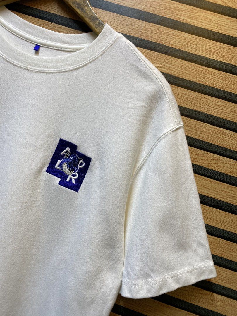 Ader Error x Maison Kitsuné, featuring a distinctive geometric "Tetris Fox" (Category: Tshirts & Polo Shirts ) located in Makati City. Submitted by drip.poww (Listing ID 1455436440, Image 3). Description: - Authentic Ader x Maison kitsune - Color: White - Size: Large - Dimes: 22x27 - Authentic - Excellent condition - Need wash, fresh from bale - Material: 100% Cotton Please don’t expect too much—these are thrifted (ukay) items. 😊 !!STILL NEGOTIA