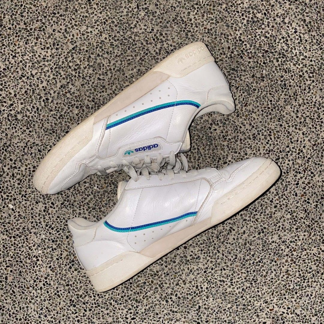 Adidas Continental 80 size 10 (Category: Sneakers) located in Manila. Submitted by johnpm (Listing ID 1455464594, Image 1). Description: - White Adidas Continental 80 sneakers - Classic blue and teal stripes - Size: US 10 (UK 9.5, FR 44, JP 280) - Made in Indonesia - Shows some wear on soles and leather, but still great for everyday wear..