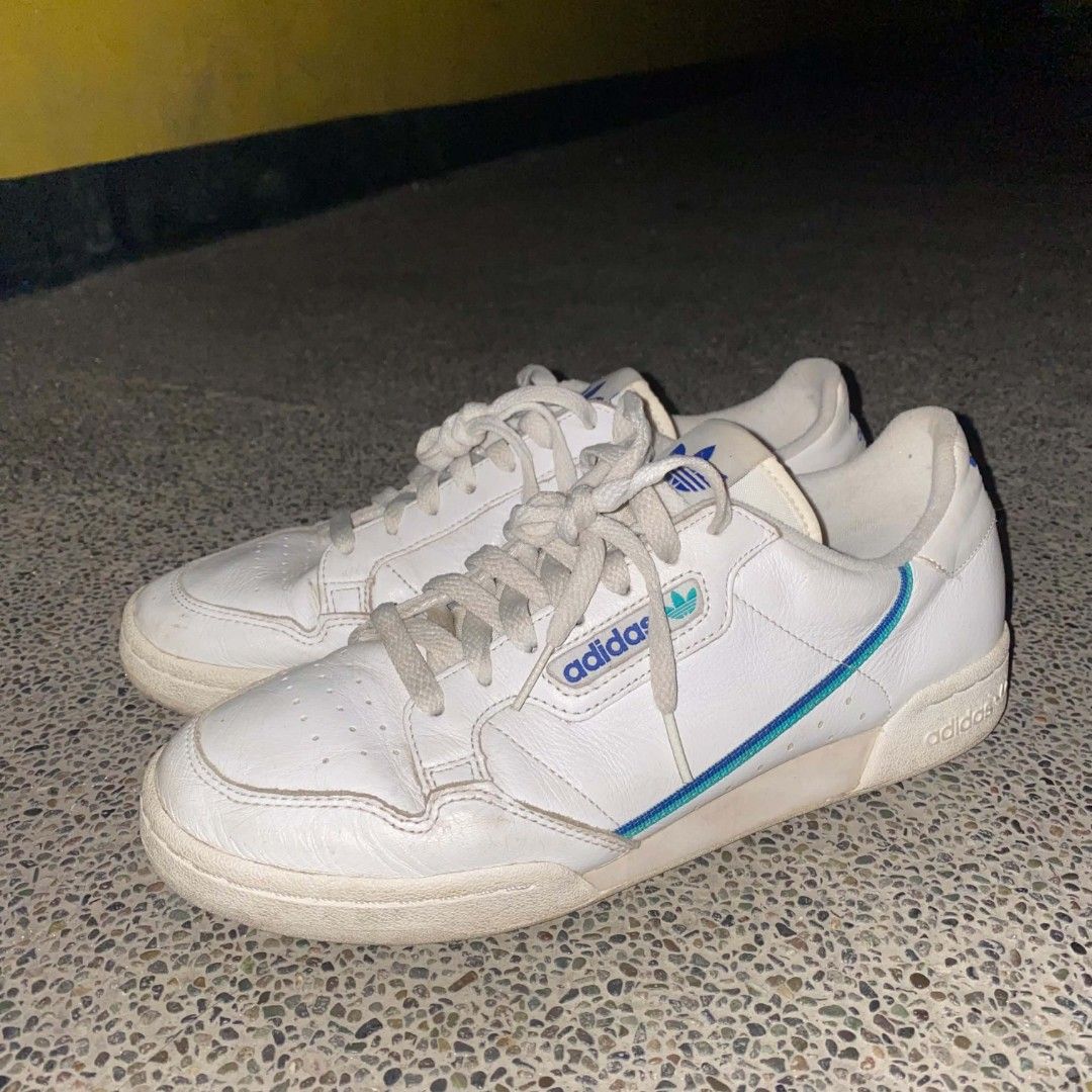 Adidas Continental 80 size 10 (Category: Sneakers) located in Manila. Submitted by johnpm (Listing ID 1455464594, Image 3). Description: - White Adidas Continental 80 sneakers - Classic blue and teal stripes - Size: US 10 (UK 9.5, FR 44, JP 280) - Made in Indonesia - Shows some wear on soles and leather, but still great for everyday wear..