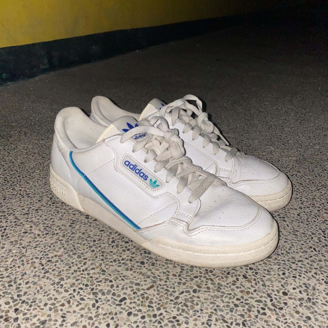Adidas Continental 80 size 10 (Category: Sneakers) located in Manila. Submitted by johnpm (Listing ID 1455464594, Image 2). Description: - White Adidas Continental 80 sneakers - Classic blue and teal stripes - Size: US 10 (UK 9.5, FR 44, JP 280) - Made in Indonesia - Shows some wear on soles and leather, but still great for everyday wear..