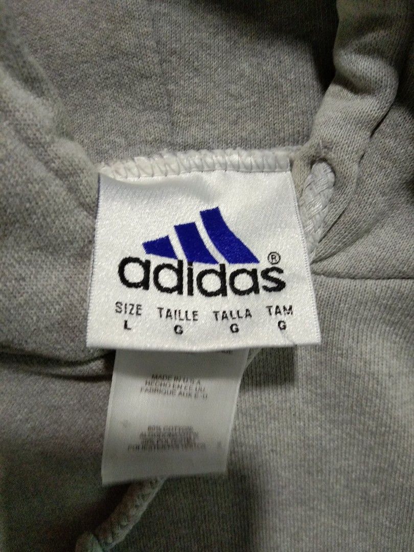 Adidas Grey Hoodie Size L (Category: Hoodies) located in Camalaniugan. Submitted by mateojuliu73958 (Listing ID 1455330532, Image 2). Description: - Grey Adidas Hoodie (pa crop) womens large, small sa boy) - issue: may loose stitch sa logo, nasa last pic - Size: Large (L) - Dimes: 28/25 - Made in USA - Material: 80% Cotton, 20% Polyester - Features classic embroidered Adidas logo on chest - Comfortable and casual design - Ideal for everyday wear.