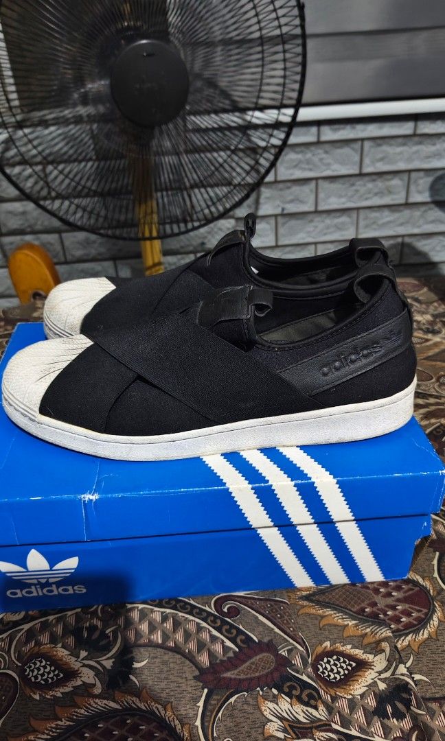 Adidas Superstar Slip On Shoes (Category: Sneakers) located in Manila. Submitted by ervinj23 (Listing ID 1455427007, Image 3). Description: - Adidas Superstar Slip-On Sneakers - Color: Black - Features classic shell toe design - Easy slip-on and off for convenience - Comes with original Adidas box - Ideal for casual and everyday wear.