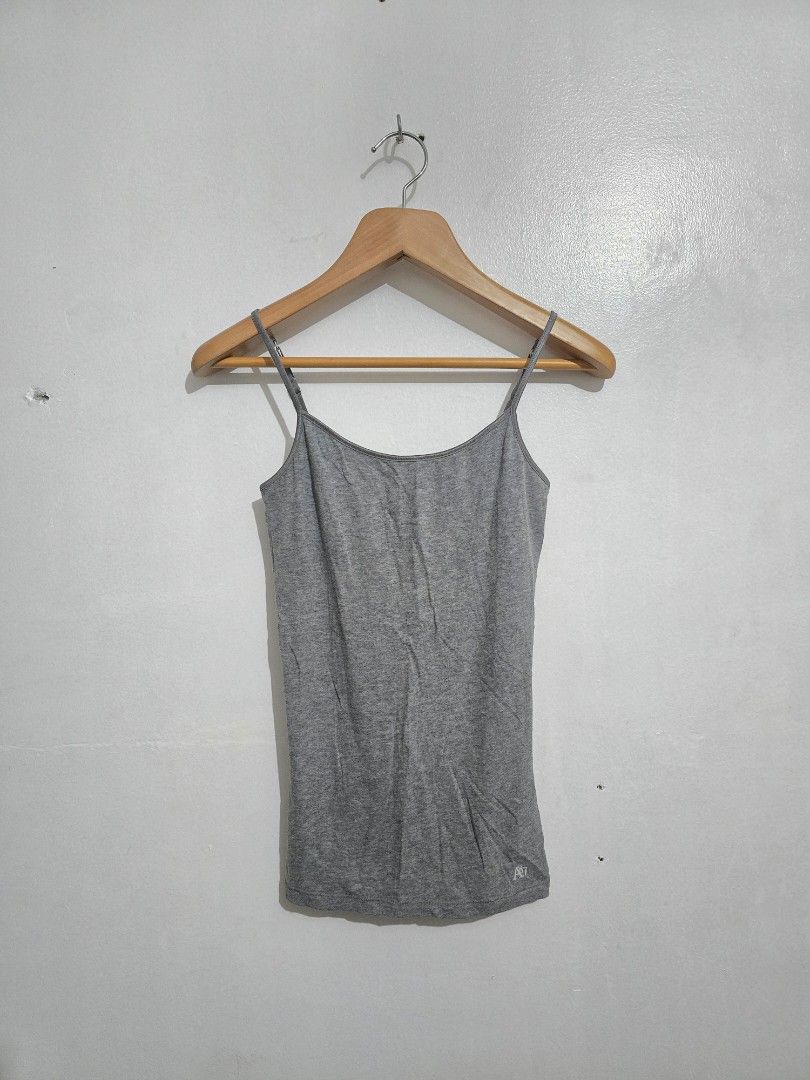 Aeropostale Grey Stretch Tank Top M/M (Category: Sleeveless) located in Quezon City. Submitted by eivan____orong (Listing ID 1455327192, Image 1). Description: - Grey tank top from Aeropostale - Made with comfortable stretch fabric - Features thin straps and a scoop neckline - Subtle Aeropostale logo on the side - Versatile for layering or wearing alone - Easy to pair with any outfit - (26L x 14W) xs - small fittings.