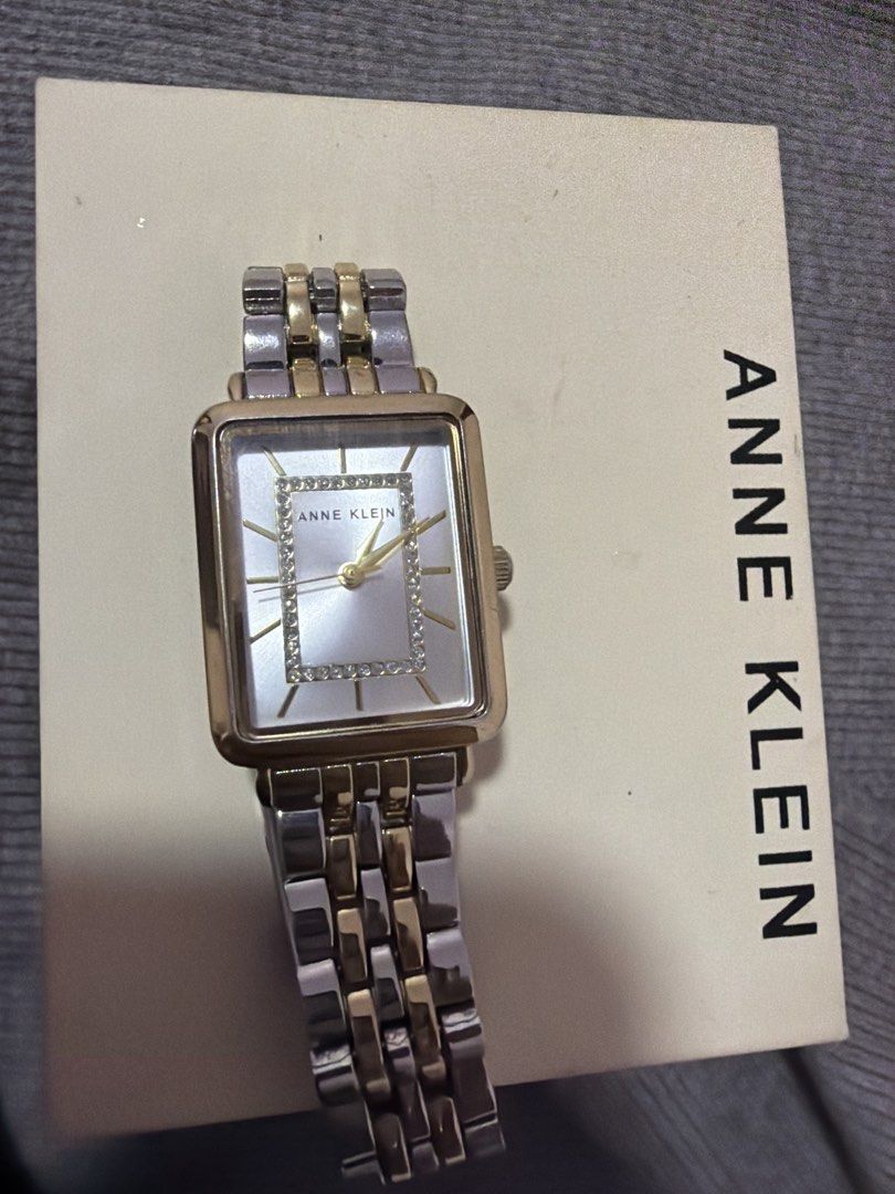 9.9 Sale Anne Klein Two-Tone Rectangle Watch with Crystal Accents (Category: Women's Watches) located in Morong. Submitted by Kaycer00 (Listing ID 1455494355, Image 1). Description: Original from 🇺🇸 LP 2200 plus sf then free original brand new gray knitted dress from teranova Issue my konting discoloration sa gilid but overall okay pa nmn sya d dn gaanon kahalata Zalora Price is 9k plus - Anne Klein two-tone metal band watch - Rectangular face 