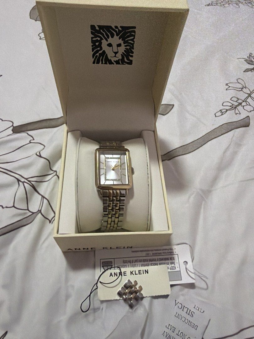 9.9 Sale Anne Klein Two-Tone Rectangle Watch with Crystal Accents (Category: Women's Watches) located in Morong. Submitted by Kaycer00 (Listing ID 1455494355, Image 3). Description: Original from 🇺🇸 LP 2200 plus sf then free original brand new gray knitted dress from teranova Issue my konting discoloration sa gilid but overall okay pa nmn sya d dn gaanon kahalata Zalora Price is 9k plus - Anne Klein two-tone metal band watch - Rectangular face 