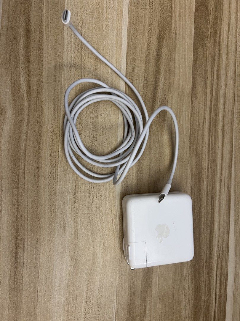 Apple 67W USB-C Power Adapter (Category: Chargers & Cables) located in Paranaque City. Submitted by closetcore (Listing ID 1455418724, Image 2). Description: Extra charger power adapter. Original price 3700 pesos.