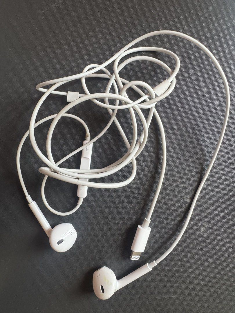 Apple EarPods with Lightning Connector (Category: Earphones) located in Imus. Submitted by kaperanggot (Listing ID 1455399621, Image 1). Description: - Original Apple EarPods with Lightning connector - Color: White - Features in-line remote with microphone for calls and music control - Compatible with iPhones and iPads that have a Lightning port - Shows minor signs of wear, but is fully functional - Selling because of an upgrade to wireless earbu