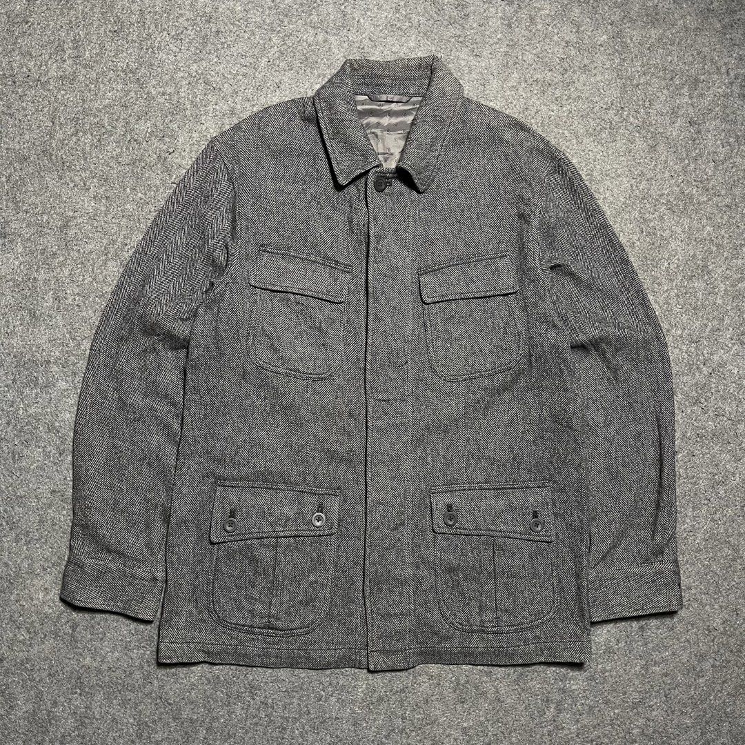 Aramis tweed Herringbone Safari Jacket (Category: Coats, Jackets and Outerwear) located in Zamboanga. Submitted by rag_20 (Listing ID 1455485453, Image 1). Description: Aramis tweed Herringbone Safari Jacket a classic pieces of vintage-inspired outerwear, combining utilitarian design with traditional tailoring textures,It uses a high-contrast grey and black herringbone weave, providing a textured, classic British or academic aesthetic, Heavy-text