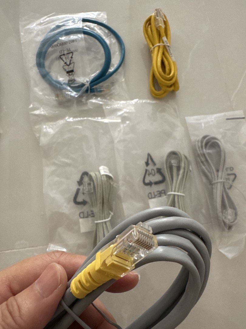 Assorted Ethernet Cables - Network Patch Cords (Category: Cables & Adaptors) located in Singapore. Submitted by ml_ginger (Listing ID 1455373401, Image 2). Description: - All for $2 - Bundle of network patch cables - Standard RJ45 connectors - Assorted lengths and colors (grey, blue, yellow) - Perfect for home networking setups - Connect routers, modems, computers, and more - Reliable for your network needs - Self collection at Block 439 Yishun a