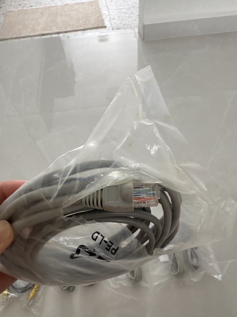 Assorted Ethernet Cables - Network Patch Cords (Category: Cables & Adaptors) located in Singapore. Submitted by ml_ginger (Listing ID 1455373401, Image 3). Description: - All for $2 - Bundle of network patch cables - Standard RJ45 connectors - Assorted lengths and colors (grey, blue, yellow) - Perfect for home networking setups - Connect routers, modems, computers, and more - Reliable for your network needs - Self collection at Block 439 Yishun a