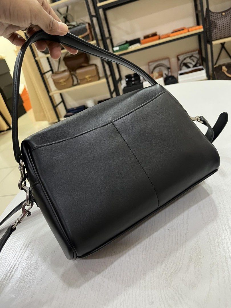 Balenciaga Rodeo Camera Bag (Category: Luxury Bags & Wallets) located in Davao. Submitted by goodstuff.149 (Listing ID 1455357966, Image 3). Description: ‼️MANILA ON-HAND‼️ Balenciaga Rodeo Camera Bag Product Details - Smooth calfskin material - One removable handle - Adjustable and removable strap - Crossbody, shoulder and hand carry - Front pocket at front with turn lock closure - Balenciaga logo engraved at front - Aged-silver hardware - Zippe
