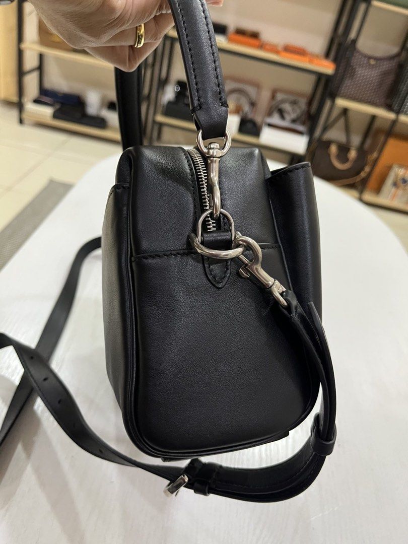 Balenciaga Rodeo Camera Bag (Category: Luxury Bags & Wallets) located in Davao. Submitted by goodstuff.149 (Listing ID 1455357966, Image 2). Description: ‼️MANILA ON-HAND‼️ Balenciaga Rodeo Camera Bag Product Details - Smooth calfskin material - One removable handle - Adjustable and removable strap - Crossbody, shoulder and hand carry - Front pocket at front with turn lock closure - Balenciaga logo engraved at front - Aged-silver hardware - Zippe