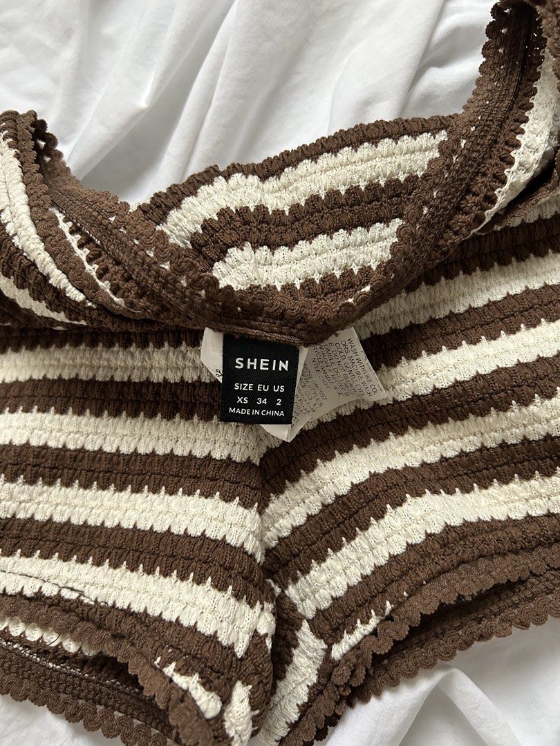 Beach Brown & White Striped Crochet Shorts (Category: Shorts) located in Bacoor. Submitted by somepiecesofsun (Listing ID 1455489904, Image 2). Description: - Brand: SHEIN - Style: Crochet Shorts - Color: Brown and White Stripes - Features: Elasticated waistband, scalloped hem detail - Size: XS - Occasion: Casual wear, beach days.