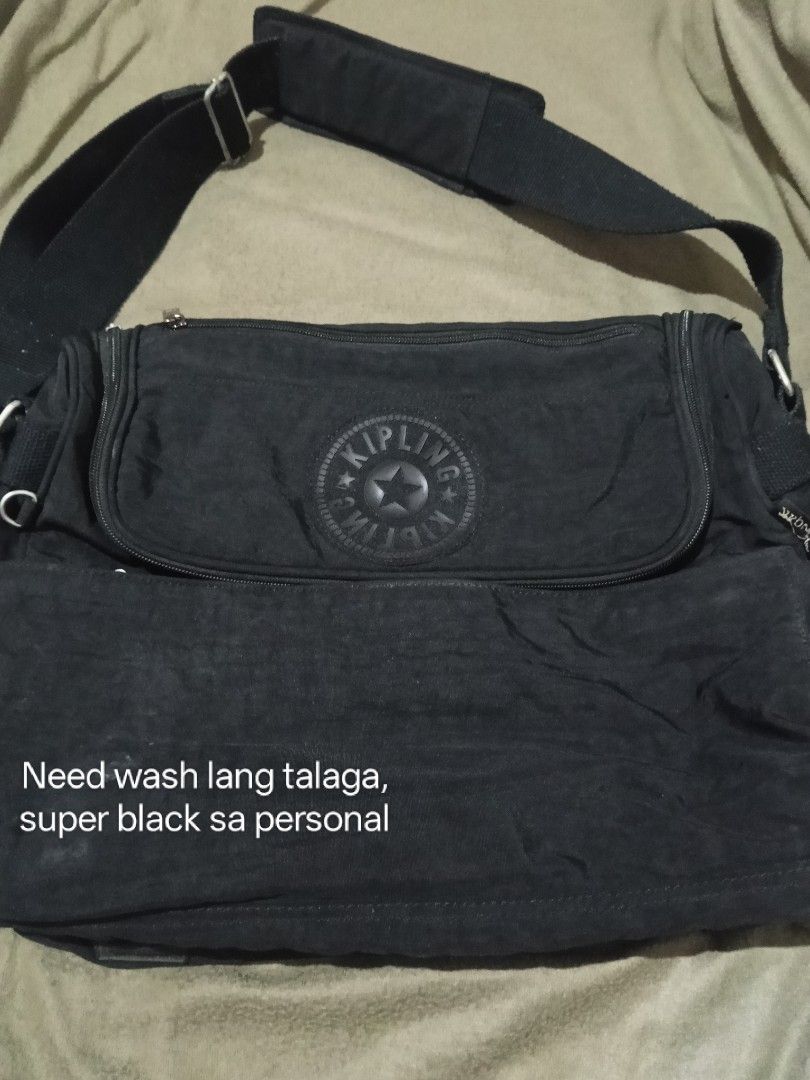 Black Kipling Shoulder Bag (Category: Shoulder Bags) located in Adams. Submitted by red__lee (Listing ID 1455196686, Image 2). Description: - Brand: Kipling - Color: Black - Material: Durable Nylon - Features: Multiple interior compartments for organization - Strap: Adjustable shoulder strap - Closure: Zipper are all working - Ideal for: Everyday use - Condition: Shows some signs of wear, but fully functional -Just need wash.