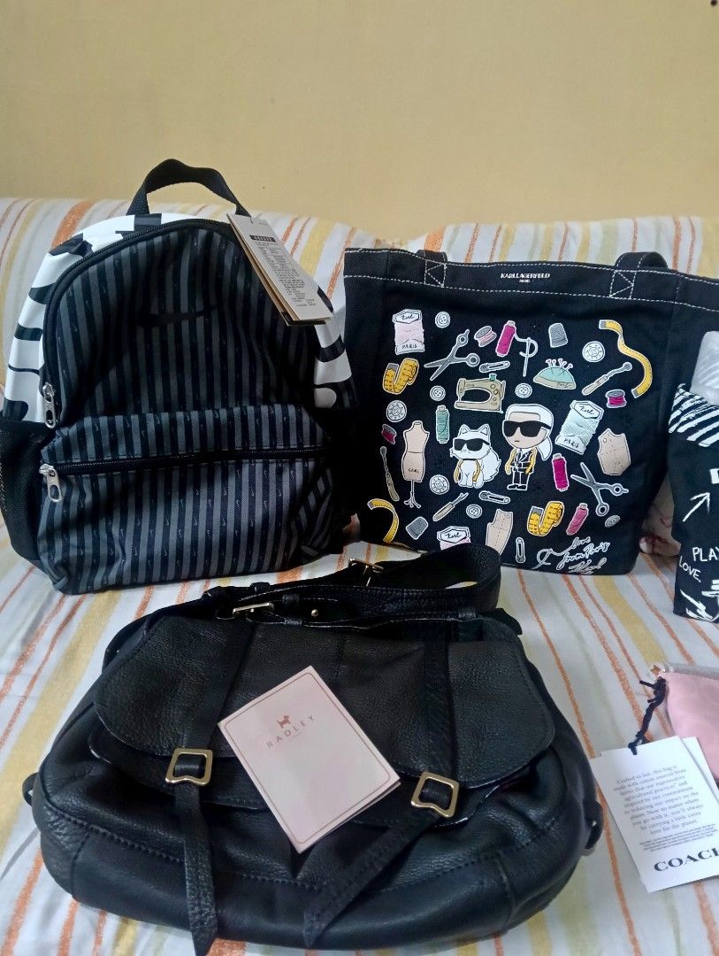 bundle items (Category: Cross-body Bags) located in Bacoor. Submitted by clonion (Listing ID 1455356461, Image 3). Description: bundles consist of authentic items brand new coach wristlet brand new coach coin purse charm brand new dkny sling bag brand new nike mini backpack used once karl lagerfield tote bag radley london - used once and additional freebies.