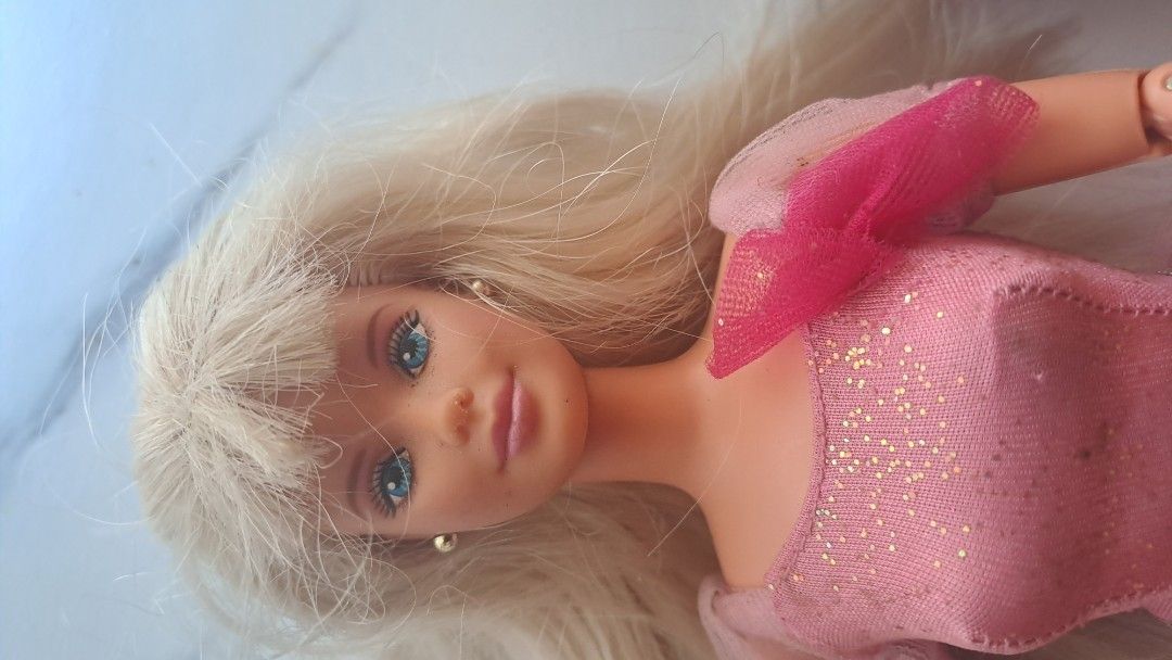 Bundle of 4 Barbie Dolls (Category: Kids Toys) located in Davao. Submitted by bravemoon_556cd5 (Listing ID 1455386345, Image 3). Description: - Bundle of 4 Barbie dolls - Includes: Princess doll, Rapunzel-inspired doll, Doctor/Nurse doll, Modern doll with grey hair - All dolls from a smoke-free home - Great for collectors or playtime.