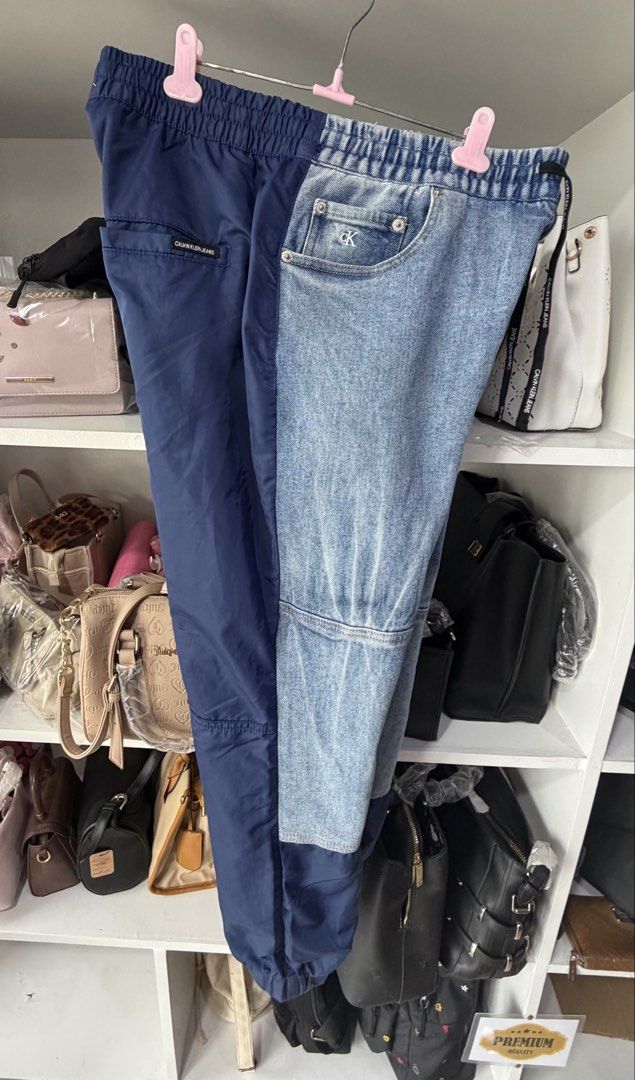 Calvin Klein two tone jogger (Category: Joggers) located in Pinamalayan. Submitted by danilotubero08 (Listing ID 1455383050, Image 3). Description: Calvin Klein two tone jogger denim/nylon size Xxl on tag best fits xl w36-38 Length 37.