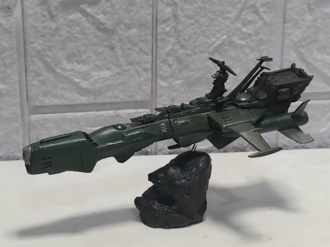 Captain Harlock Space Battleship ARCADIA (Category: Gundam & Model Kits) located in Bulacan. Submitted by rowmon24 (Listing ID 1455480625, Image 1). Description: - Captain Harlock Space Battleship ARCADIA ( complete )Japan 1999 - Unique green color scheme - Features skull and crossbones insignia - Mounted on a display stand for easy showcasing - Ideal addition for any collector's display.
