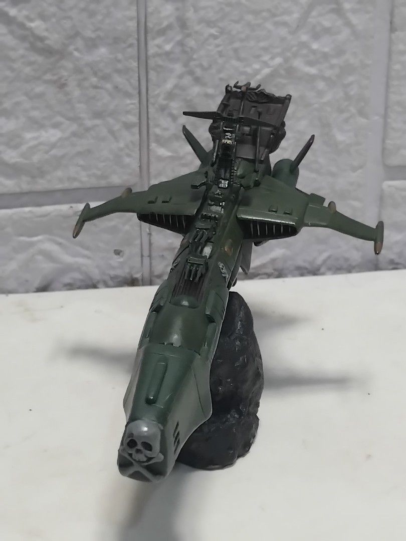 Captain Harlock Space Battleship ARCADIA (Category: Gundam & Model Kits) located in Bulacan. Submitted by rowmon24 (Listing ID 1455480625, Image 3). Description: - Captain Harlock Space Battleship ARCADIA ( complete )Japan 1999 - Unique green color scheme - Features skull and crossbones insignia - Mounted on a display stand for easy showcasing - Ideal addition for any collector's display.