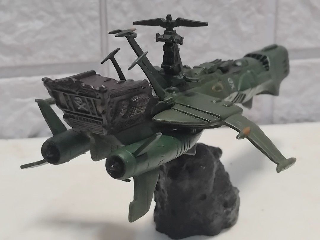 Captain Harlock Space Battleship ARCADIA (Category: Gundam & Model Kits) located in Bulacan. Submitted by rowmon24 (Listing ID 1455480625, Image 2). Description: - Captain Harlock Space Battleship ARCADIA ( complete )Japan 1999 - Unique green color scheme - Features skull and crossbones insignia - Mounted on a display stand for easy showcasing - Ideal addition for any collector's display.