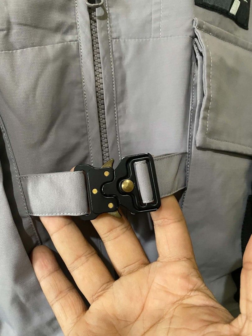 CATALOG Acid-House Geologic Temp Record Vest (Category: Vests) located in Manila. Submitted by cozci (Listing ID 1455372329, Image 3). Description: - CATALOG Grey Utility Vest - Unique Acid-House Geologic Temp Record design - Multiple pockets with buckle and strap closures - Mesh lining inside - Size: M / 175 / 92A - Material: Polyethylene.
