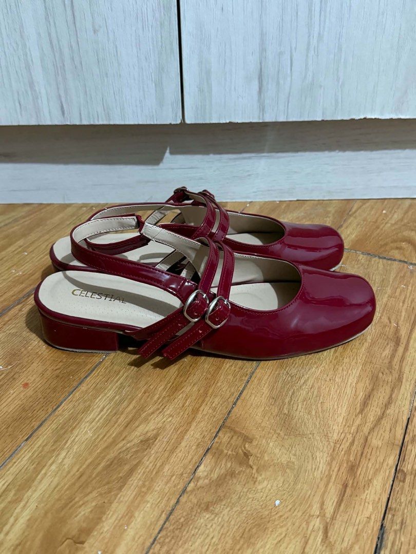Celestial Red Patent Mary Jane Block Heels Size 8 (Category: Heels) located in Paranaque City. Submitted by shopnichoppy (Listing ID 1455342650, Image 2). Description: - Red patent leather Mary Jane style shoes - Features a comfortable low block heel - Adjustable ankle straps with buckle closure for a secure fit - 'Celestial' brand visible on insole.