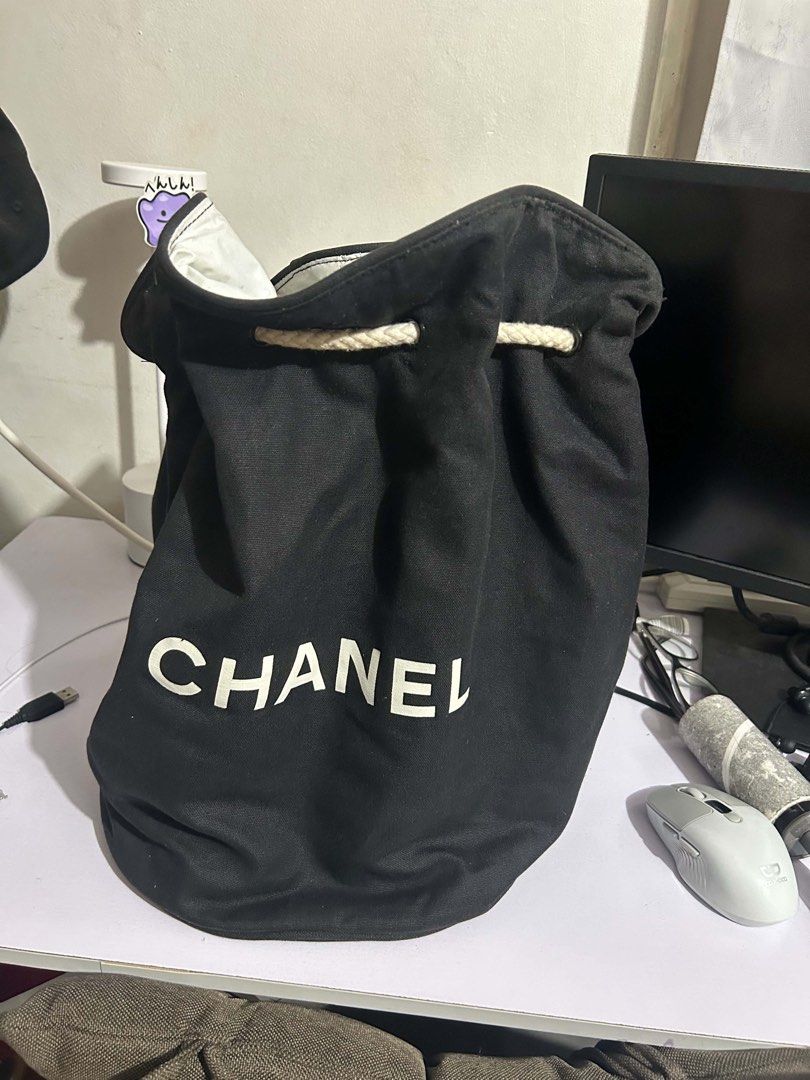 Chanel Black Canvas Drawstring Bucket Bag (Category: Luxury Bags & Wallets) located in Caloocan City. Submitted by jill262626 (Listing ID 1455331315, Image 1). Description: - Iconic black canvas Chanel drawstring bag - Features rope handles and closure - Round base design - Spacious interior for everyday essentials or travel - Classic and simple aesthetic - Authentic .