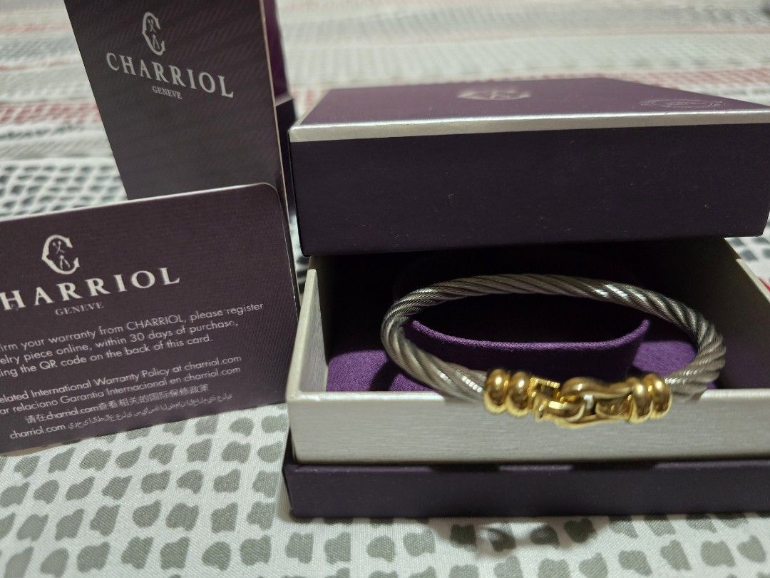 Charriol Geneva Cable Bracelet with Gold Clasp (Category: Bracelets) located in Las Pinas. Submitted by luxeprelovedstuff (Listing ID 1455387063, Image 1). Description: - Authentic Charriol Ibiza cable bracelet - Signature twisted cable design - Polished gold clasp - Includes original box - Includes international warranty card - Purchased on August 7, 2022 - Perfect addition to your jewelry collection store bought, with complete inclusion .