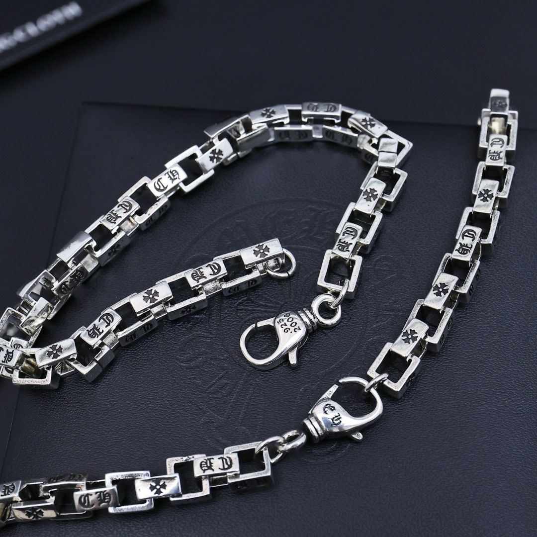 Chrome Hearts Silver Bracelet with Cross Motifs (Category: Bracelets) located in Caloocan City. Submitted by freemountain-814cc6 (Listing ID 1455476331, Image 2). Description: - Authentic Chrome Hearts bracelet - Silver chain with repeating cross and square links - Lobster clasp closure - Approximately 8 inches in length - Comes with original box and polishing cloth - Perfect addition to any collection.