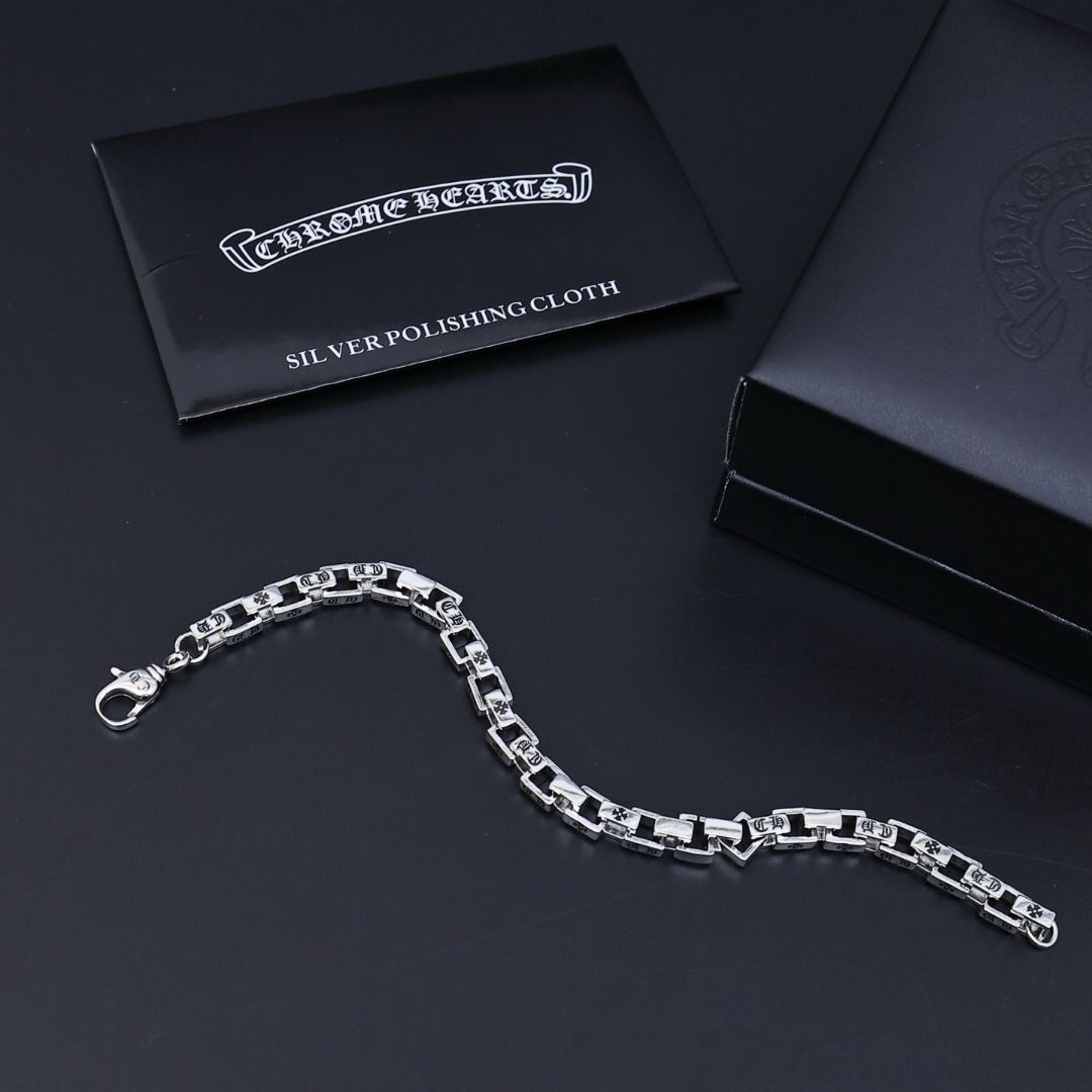 Chrome Hearts Silver Bracelet with Cross Motifs (Category: Bracelets) located in Caloocan City. Submitted by freemountain-814cc6 (Listing ID 1455476331, Image 3). Description: - Authentic Chrome Hearts bracelet - Silver chain with repeating cross and square links - Lobster clasp closure - Approximately 8 inches in length - Comes with original box and polishing cloth - Perfect addition to any collection.