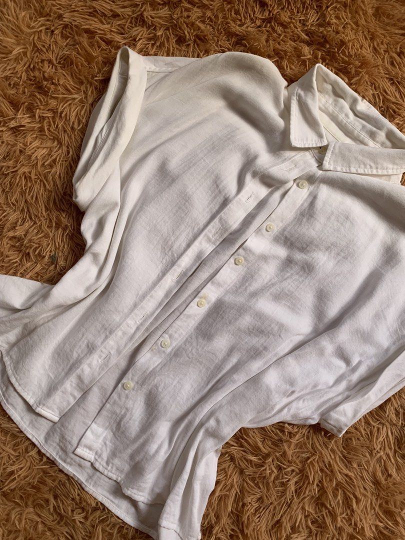 Classic White Button-Down Shirt (Category: Blouses) located in Quezon City. Submitted by cheann_ (Listing ID 1455325610, Image 2). Description: ~Clean white ~Collared button-down shirt ~Ideal for office, school, casual outings, or worn open as a light layer.