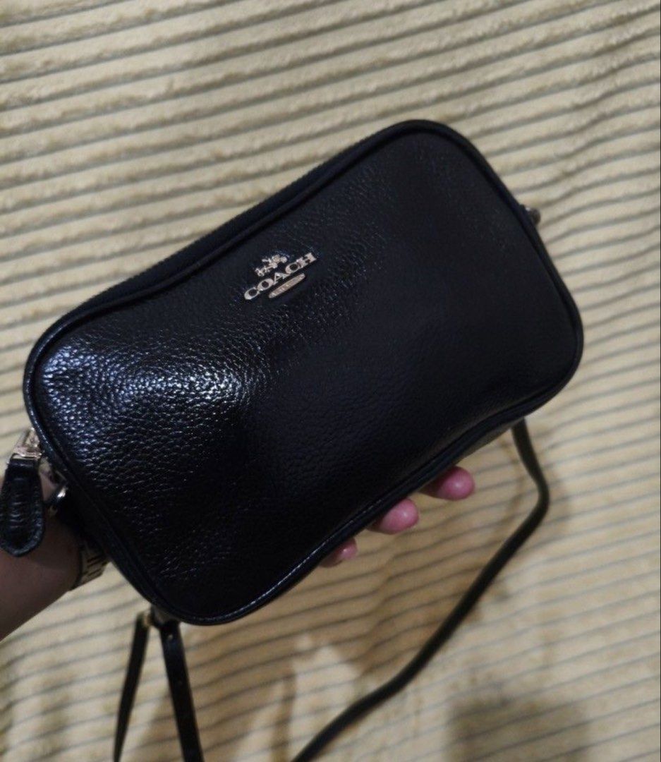 Coach Camera Sling Bag (Category: Cross-body Bags) located in Mandaluyong City. Submitted by ekaadoll (Listing ID 1455336159, Image 1). Description: authentic coach sling bag. .