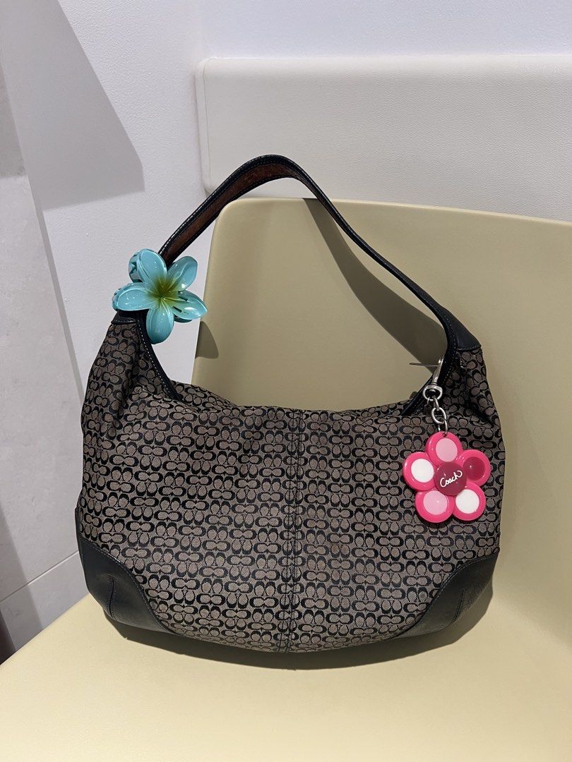 Coach Ergo Hobo Bag 6618 (Category: Shoulder Bags) located in Makati City. Submitted by heyitscess (Listing ID 1455349521, Image 1). Description: slightly negotiable. with flaws. 🌸.