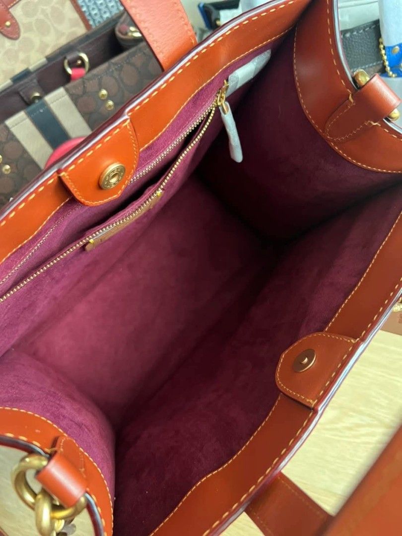 Coach Field Tote with Patches (Category: Tote Bags) located in Quezon City. Submitted by bagsboutiqueph (Listing ID 1455443887, Image 3). Description: LAST PRICE POSTED. LIMITED STOCKS! BRANDNEW WITH INCLUSIONS. COLOR MAY SLIGHTLY VARY IN ACTUAL DUE TO LIGHTING AND CAMERA SETTING. OTHER PHOTOS WILL BE SEND DURING PURCHASE AND FOR SURE BUYERS ONLY. WHEN IN DOUBT, DO NOT ORDER. THANK YOU..