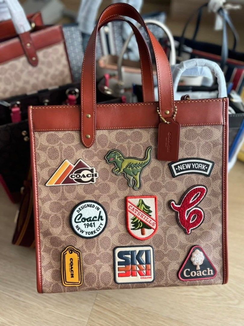 Coach Field Tote with Patches (Category: Tote Bags) located in Quezon City. Submitted by bagsboutiqueph (Listing ID 1455443887, Image 1). Description: LAST PRICE POSTED. LIMITED STOCKS! BRANDNEW WITH INCLUSIONS. COLOR MAY SLIGHTLY VARY IN ACTUAL DUE TO LIGHTING AND CAMERA SETTING. OTHER PHOTOS WILL BE SEND DURING PURCHASE AND FOR SURE BUYERS ONLY. WHEN IN DOUBT, DO NOT ORDER. THANK YOU..