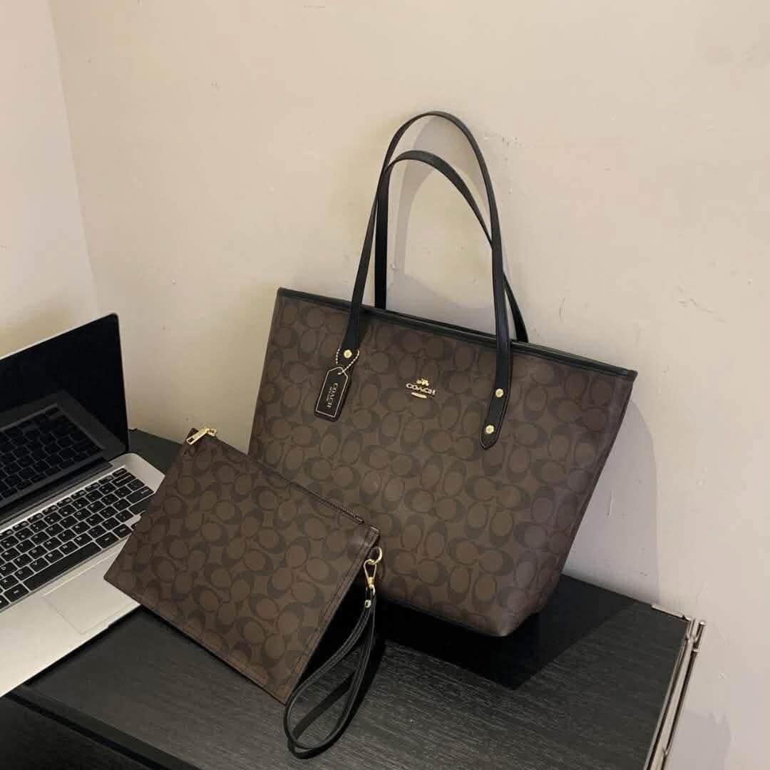 Coach Tote bag with pouch (Category: Tote Bags) located in Quezon City. Submitted by stuffs.hellyy (Listing ID 1455495293, Image 3). Description: with box.