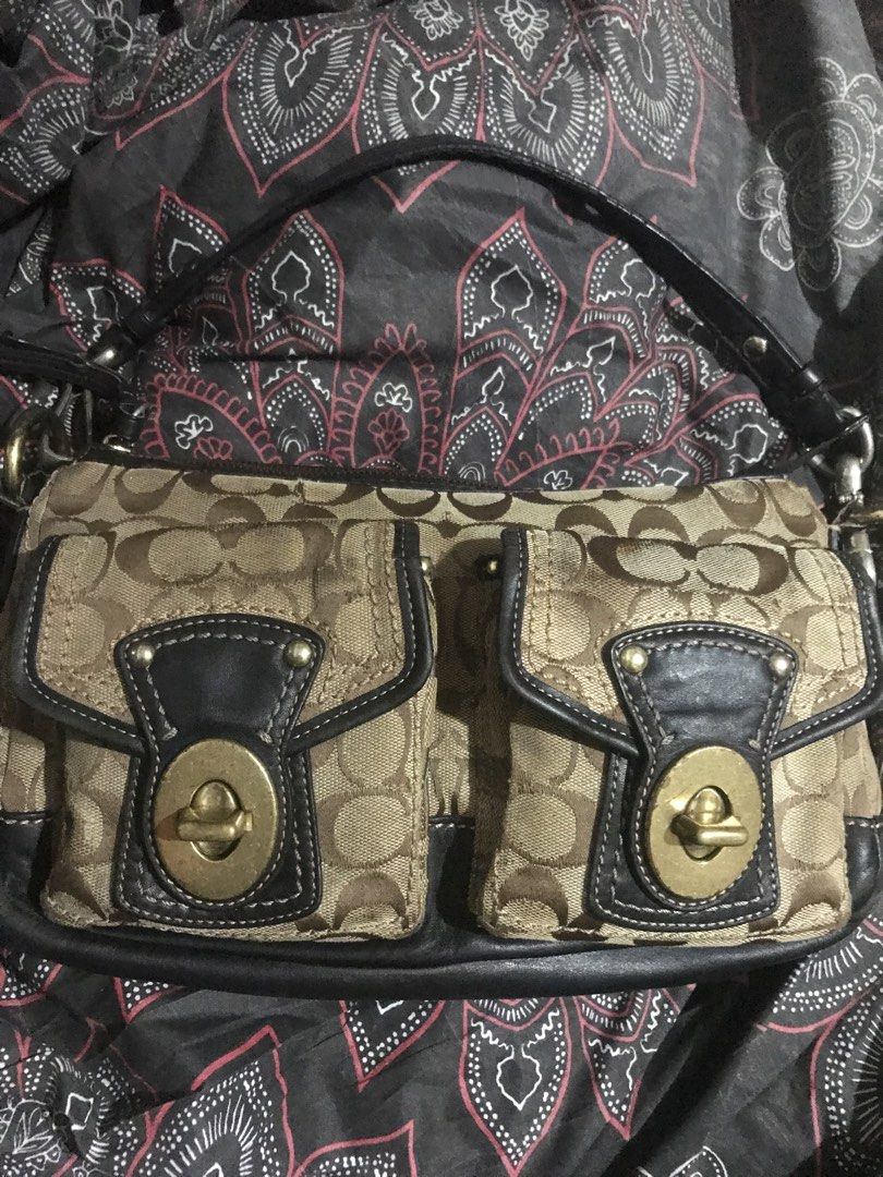 Coach Vintage Legacy Turnlock Bag (Category: Luxury Bags & Wallets) located in Cebu City. Submitted by ellie_0613 (Listing ID 1455496962, Image 1). Description: Coach Legacy Bag hi! selling my coach legacy bag for 7000 + shipping — needs restoration — replaced strap (coach strap) — rust on hardware — rubs as some materials are made of canvas can also consider swap / trade (prio: soho) ‼️ please manage expectation as this is a vintage and preloved